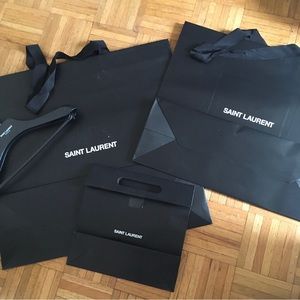 3 Saint Laurent bags and hanger. Conditions as pictured.